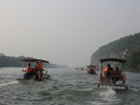 Med  bambusbåd nedad Lijiang floden