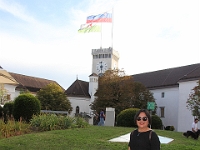 Slotsfruen med det slovenske flag i baggrunden