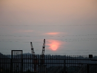 Solnedgang over Fangchenggang